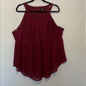 Plus size sleeveless peplum top